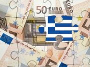 Guvernul Greciei a aprobat lansarea programului de restructurare a datoriilor